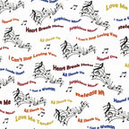 Elvis Presley song titles Hound Dog Love Me Tender Suspicious Minds All Shook Up multicolour text music notes white novelty retro fabric for Elvis fans quilts and gifts