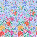 Embroidered-look floral border print blue fabric graduating from small buds to bold blooms for quilt borders cushion covers tote bags and sewing projects