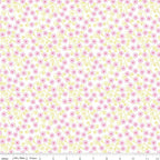 Pink ditsy flowers with pale yellow curling swirls on white Fairy Garden fabric for girls quilts nursery décor and patchwork sewing projects