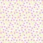 Pink ditsy flowers with pale yellow curling swirls on white Fairy Garden fabric for girls quilts nursery décor and patchwork sewing projects