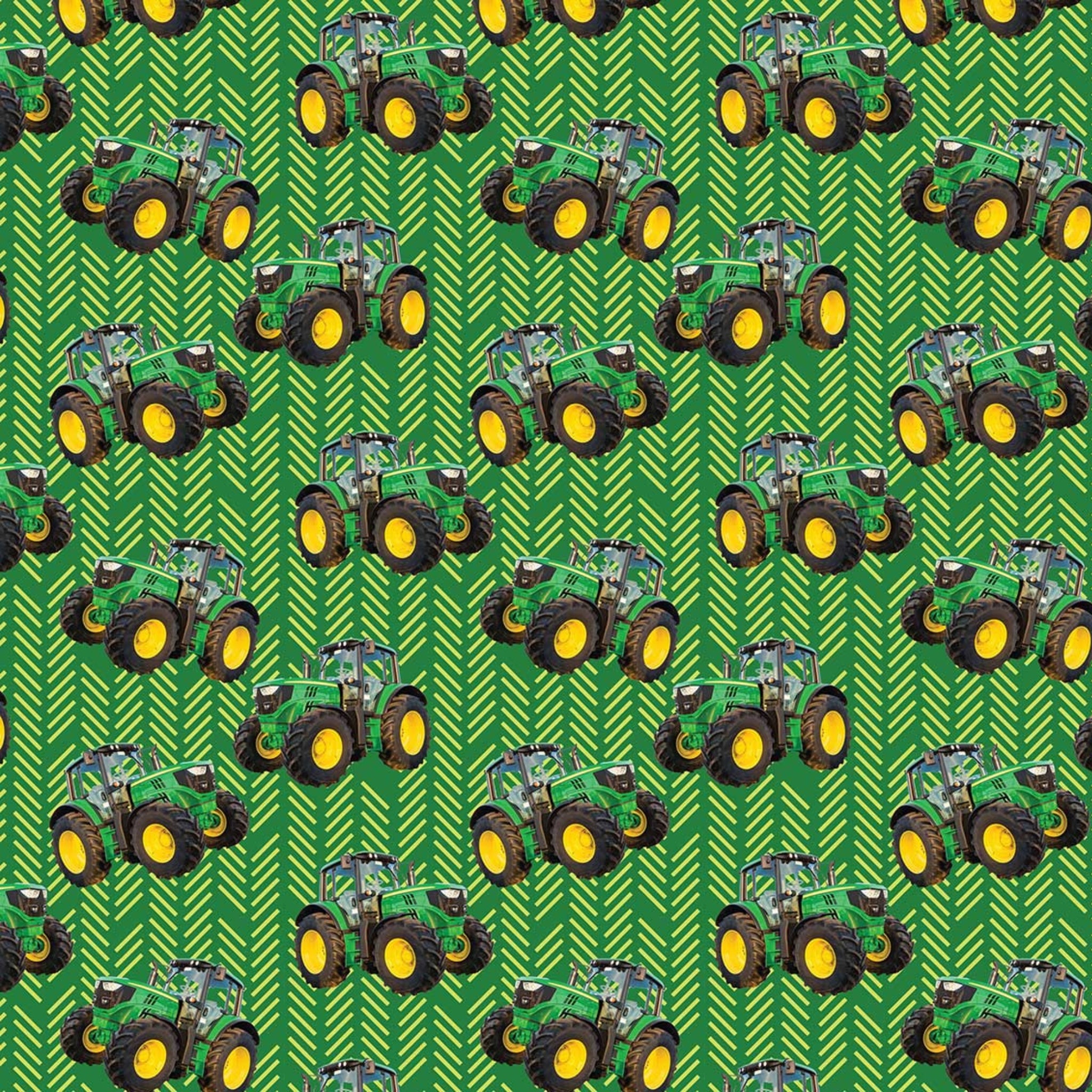 Green tractor toss fabric with patterned background, perfect for boys' quilting projects for farm lovers