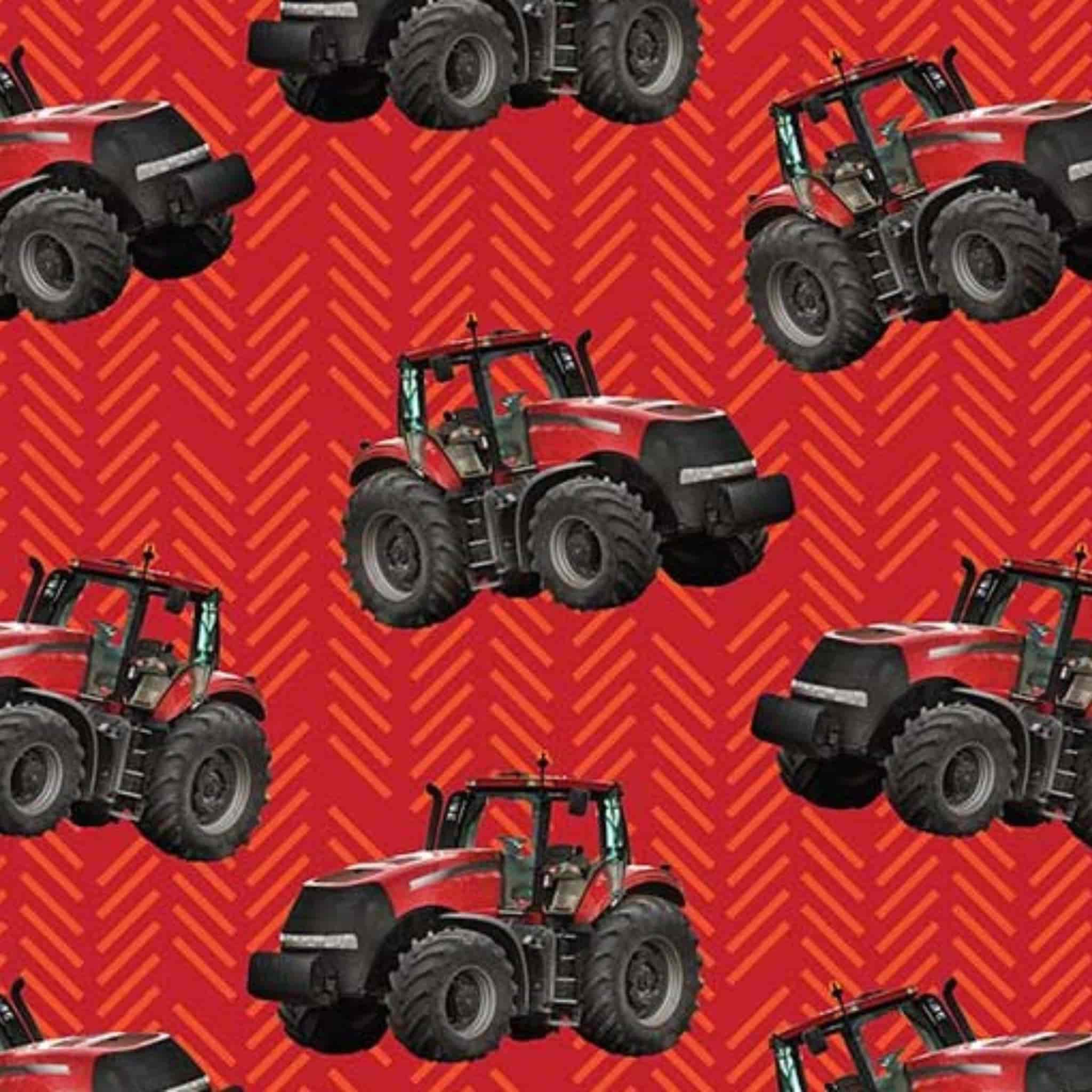 Red tractor toss fabric with patterned background, perfect for boys' quilting projects for farm lovers