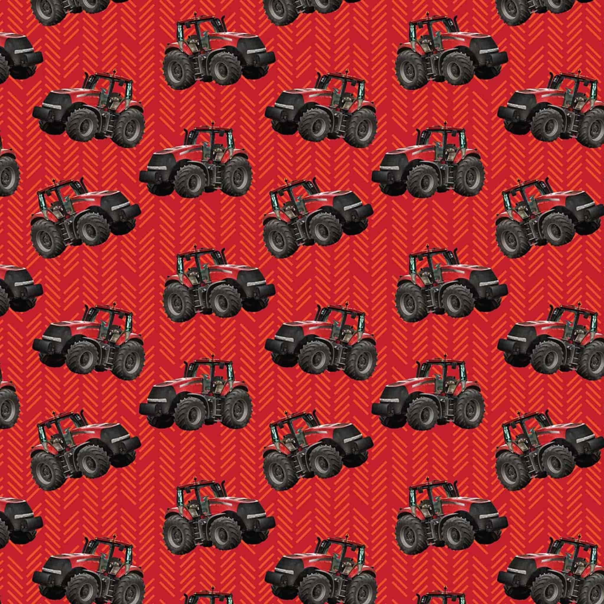 Red tractor toss fabric with patterned background, perfect for boys' quilting projects for farm lovers