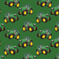Green tractor toss fabric on solid green background, perfect for boys' quilting projects for farm lovers