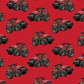 Red tractor toss fabric on solid red background, perfect for boys' quilting projects for farm lovers