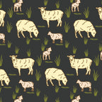 Australian sheep and lambs on black fabric with farm animals and outback motifs for quilting, patchwork, and sewing