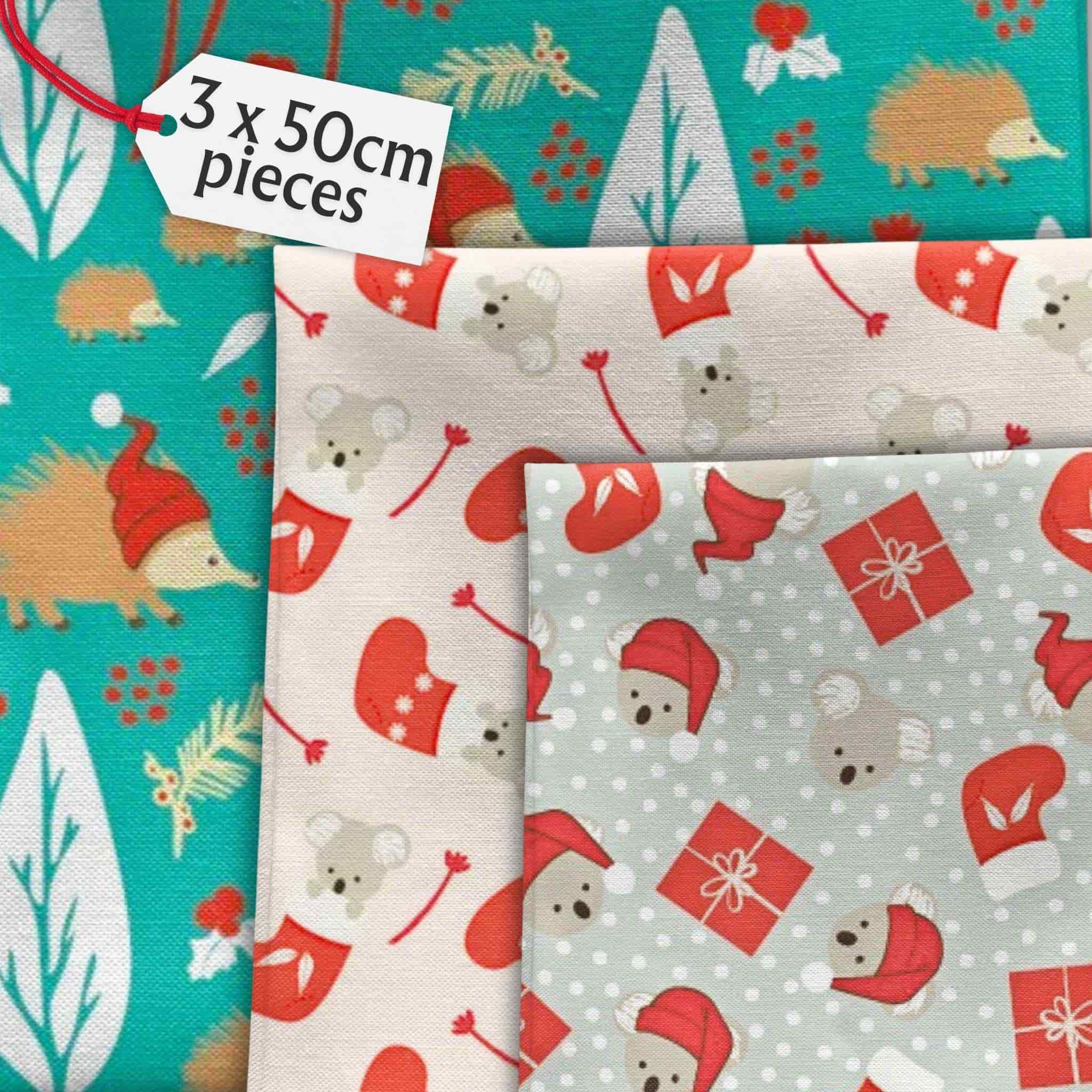 Bundle of 3 coordinating Christmas fabrics featuring Australian koalas, echidnas and wombats

