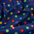Rainbow multicolour polka dots deep navy novelty fabric for children's quilts play mats and nursery décor