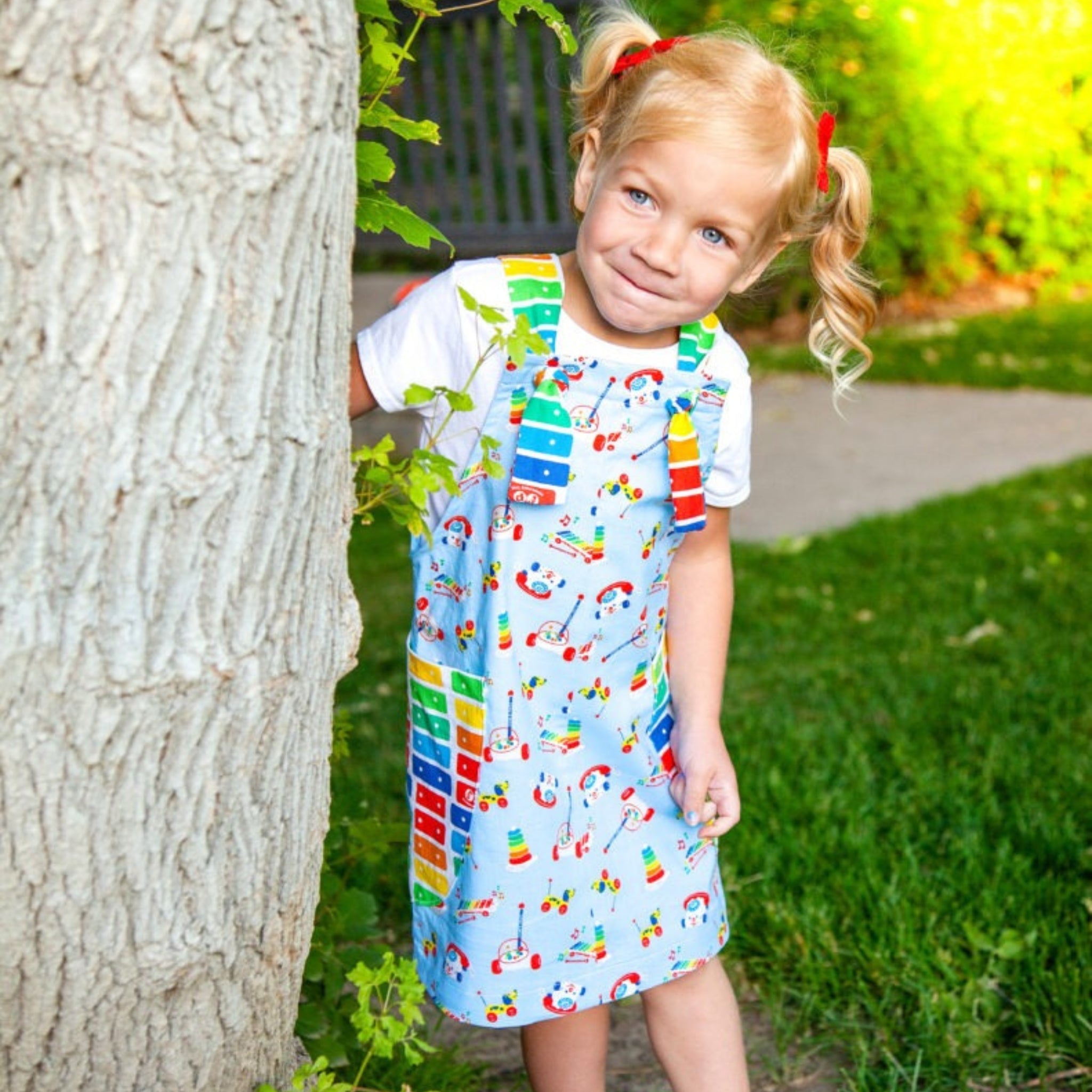 Fisher Price retro toys xylophone fabric kids jumper dress pinafore blue Riley Blake quilting cotton children's sewing project
