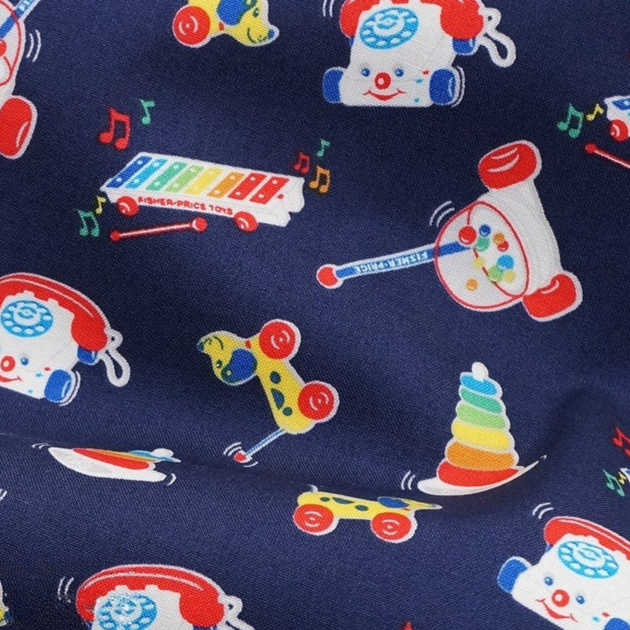 Navy fabric with Fisher-Price classic toy motifs: Telephone and Xylophone