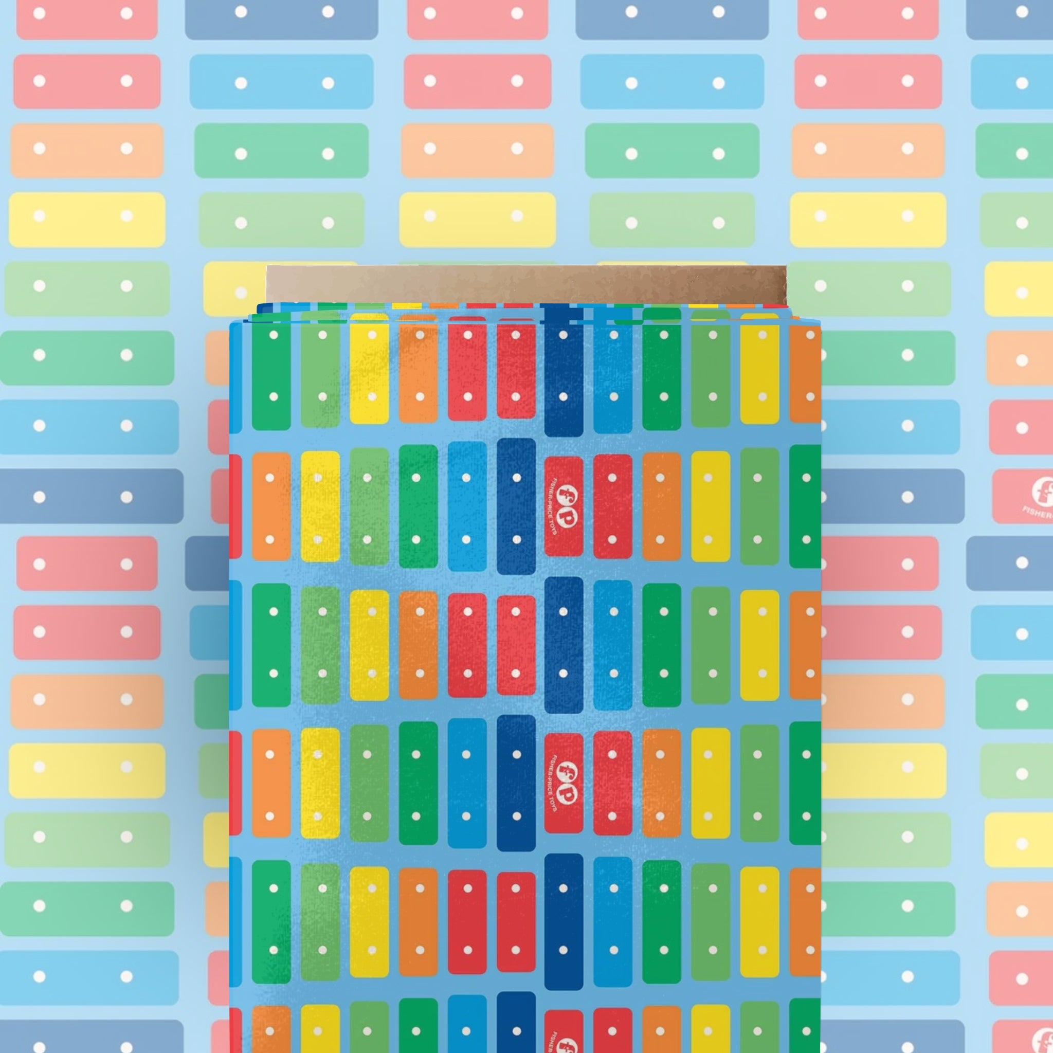 Blue quilting cotton with Fisher-Price Xylophone rainbow keys stripe pattern