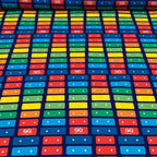 Fisher Price xylophone rainbow music keys red orange yellow green blue deep navy novelty fabric for children's quilts and nursery décor
