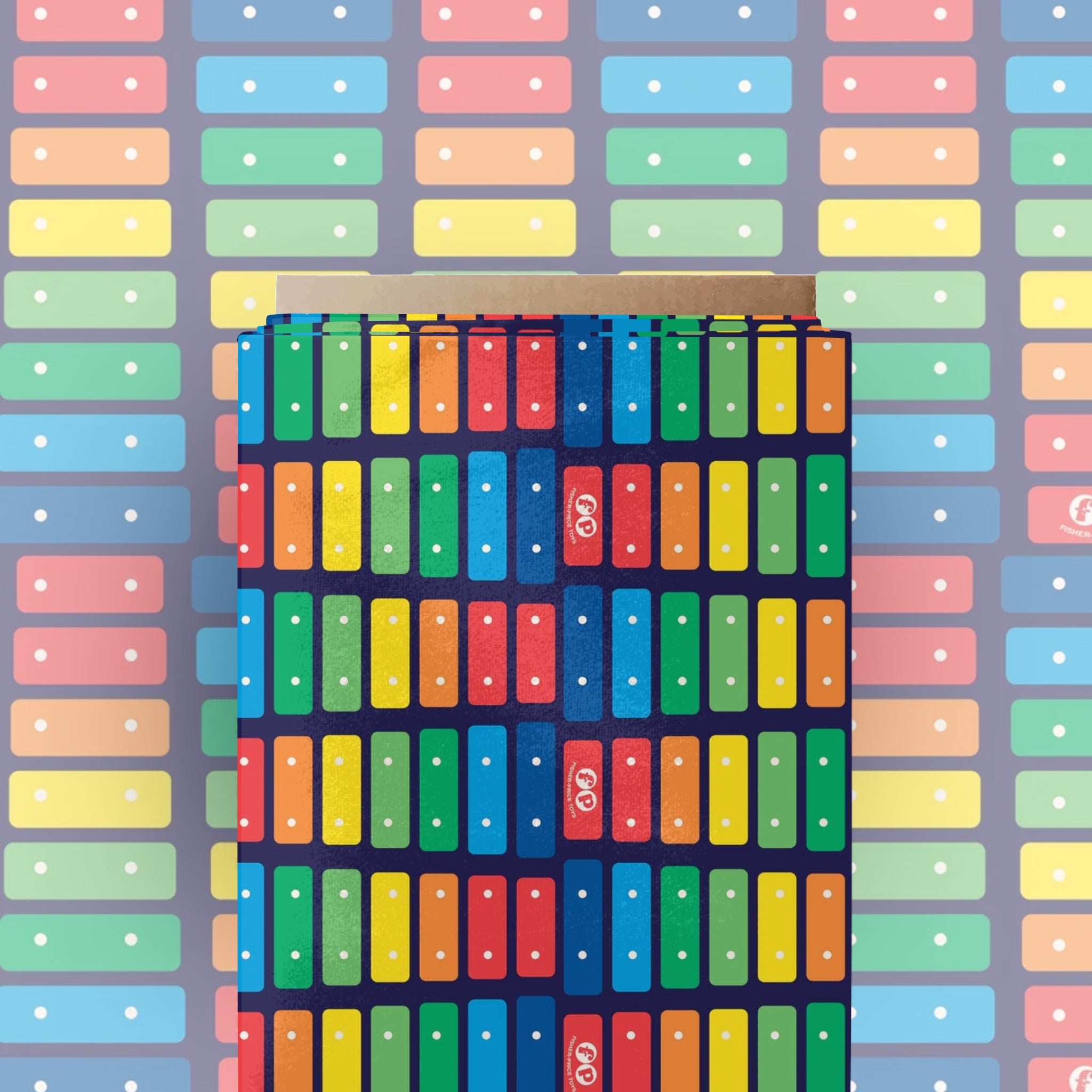 Navy fabric with Fisher-Price Xylophone rainbow keys stripe pattern