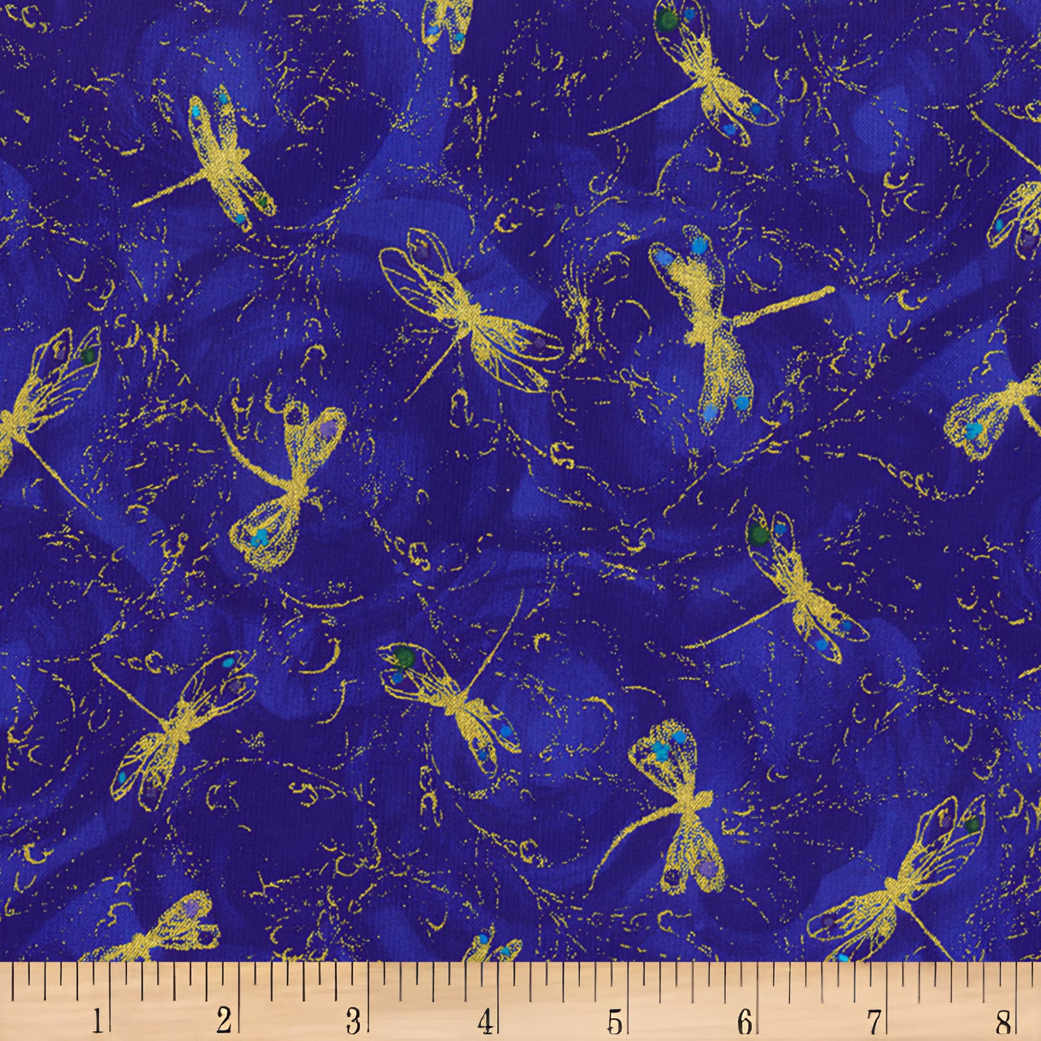 Metallic gold dragonfly tossed print turquoise accents royal blue background fabric for feature quilts bags and dragonfly patchwork sewing projects