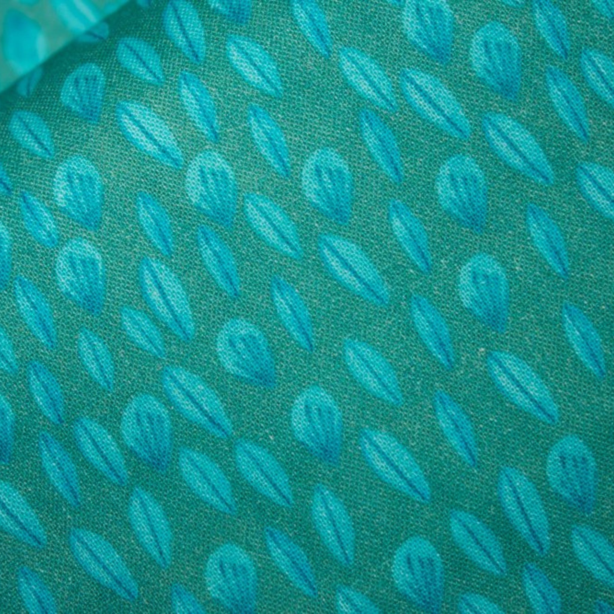 Tiny teal leaves turquoise fabric for baby quilts children's quilts and patchwork sewing projects