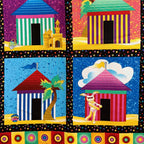 Colourful beach hut cabana tile blocks close-up bottom left sandcastle sailor bear palm tree multi novelty kids beach quilts