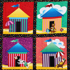 Colourful beach hut cabana tile blocks close-up top right multi novelty kids beach quilts wall hangings