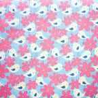 White birds blue wings pink daisy flowers sky blue background girls' novelty quilting fabric patchwork sewing projects