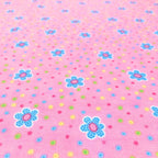 Tossed daisy flowers aqua pink novelty fabric for children's quilts girls' quilts and patchwork sewing projects