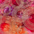 Gold metallic concentric circles on pink yellow orange purple ombré fabric for elegant quilts and patchwork sewing projects