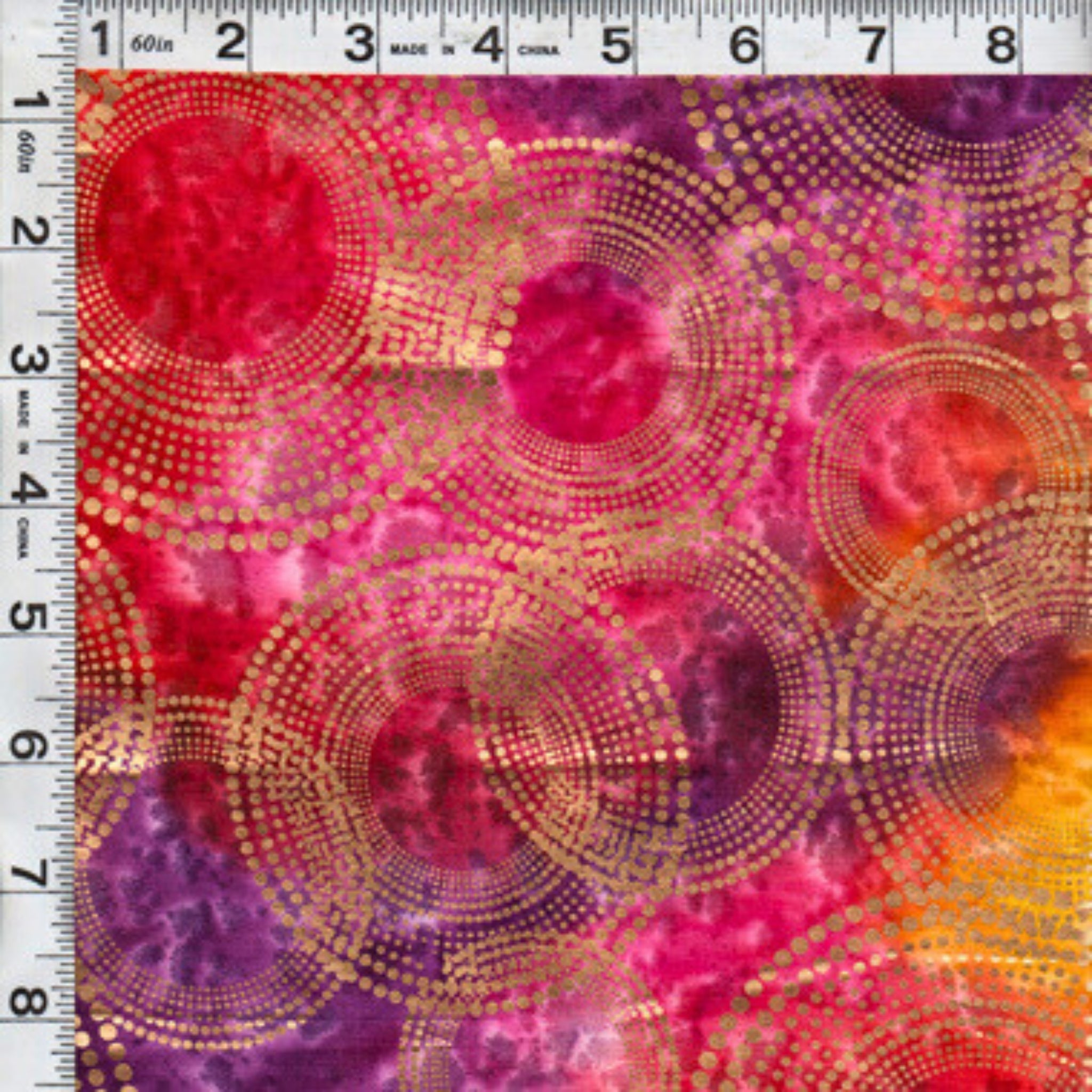 Gold metallic dotted circles on pink yellow orange purple ombré fabric for elegant quilts and patchwork sewing projects