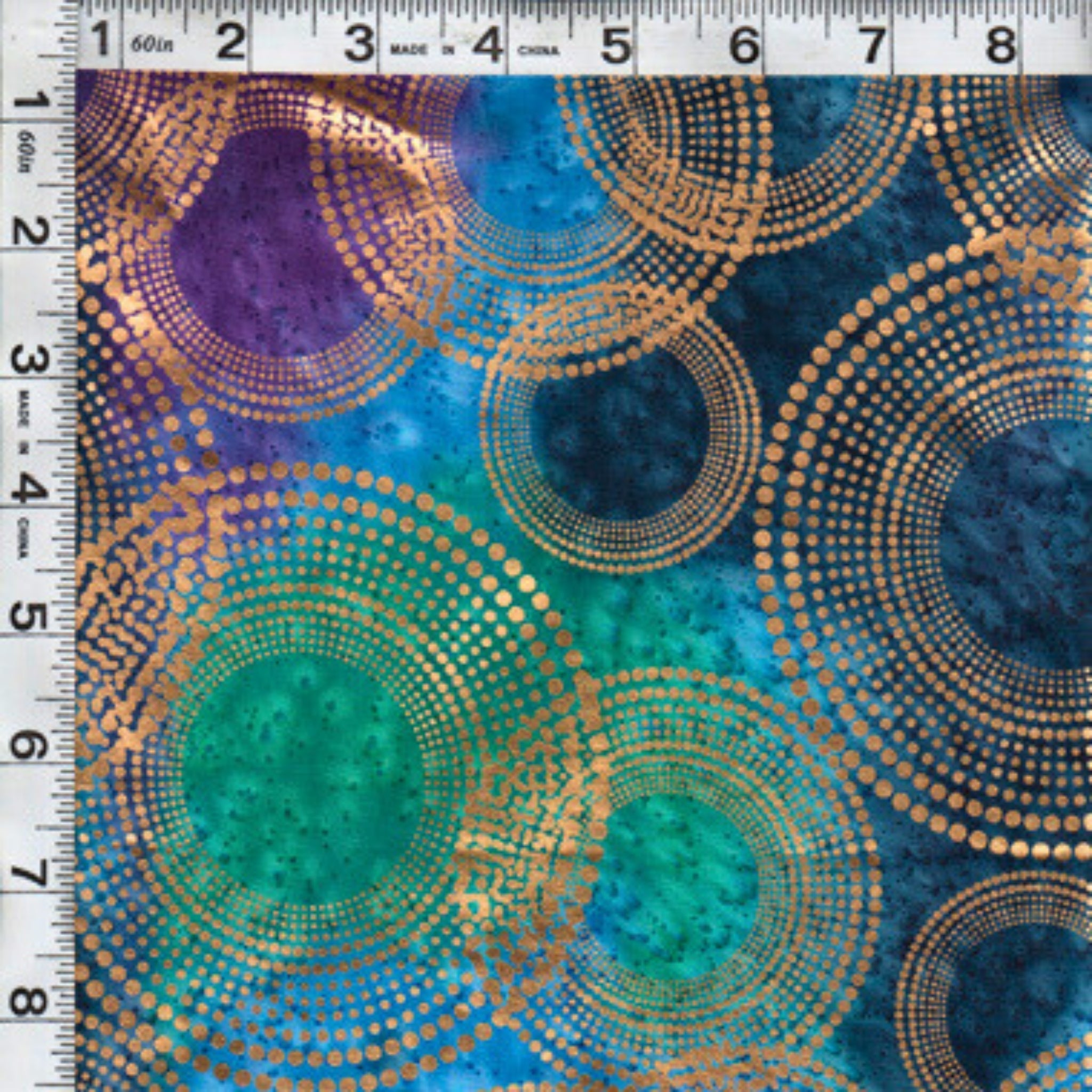 Gold metallic dotted circles on purple turquoise teal ombré fabric for elegant quilts and patchwork sewing projects