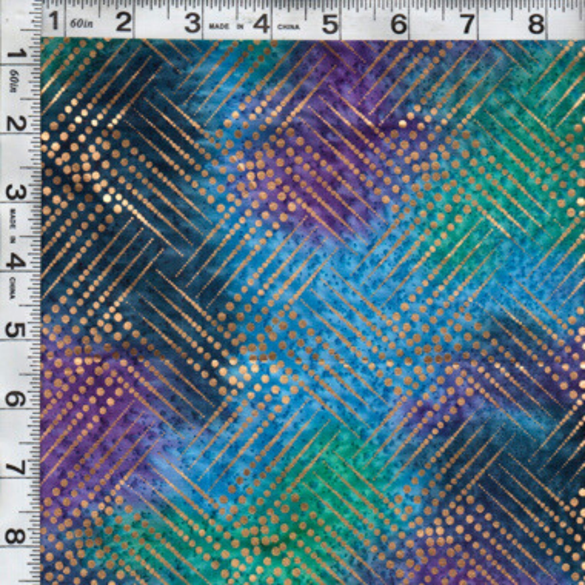 Gold metallic diagonal grid pattern on purple turquoise teal ombré fabric for elegant quilts and patchwork sewing projects