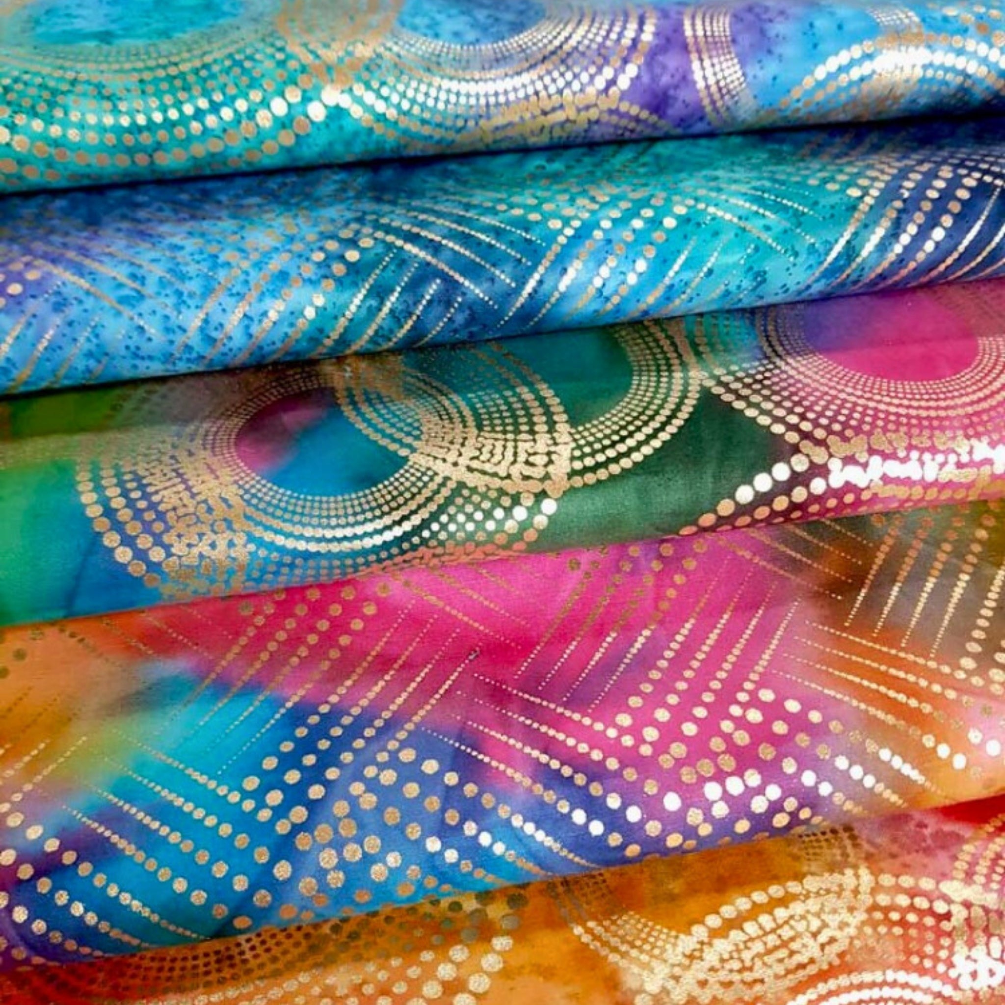 Gold Mine metallic ombre geometric blender fabric collection in rainbow pink blue colourways for quilts patchwork projects