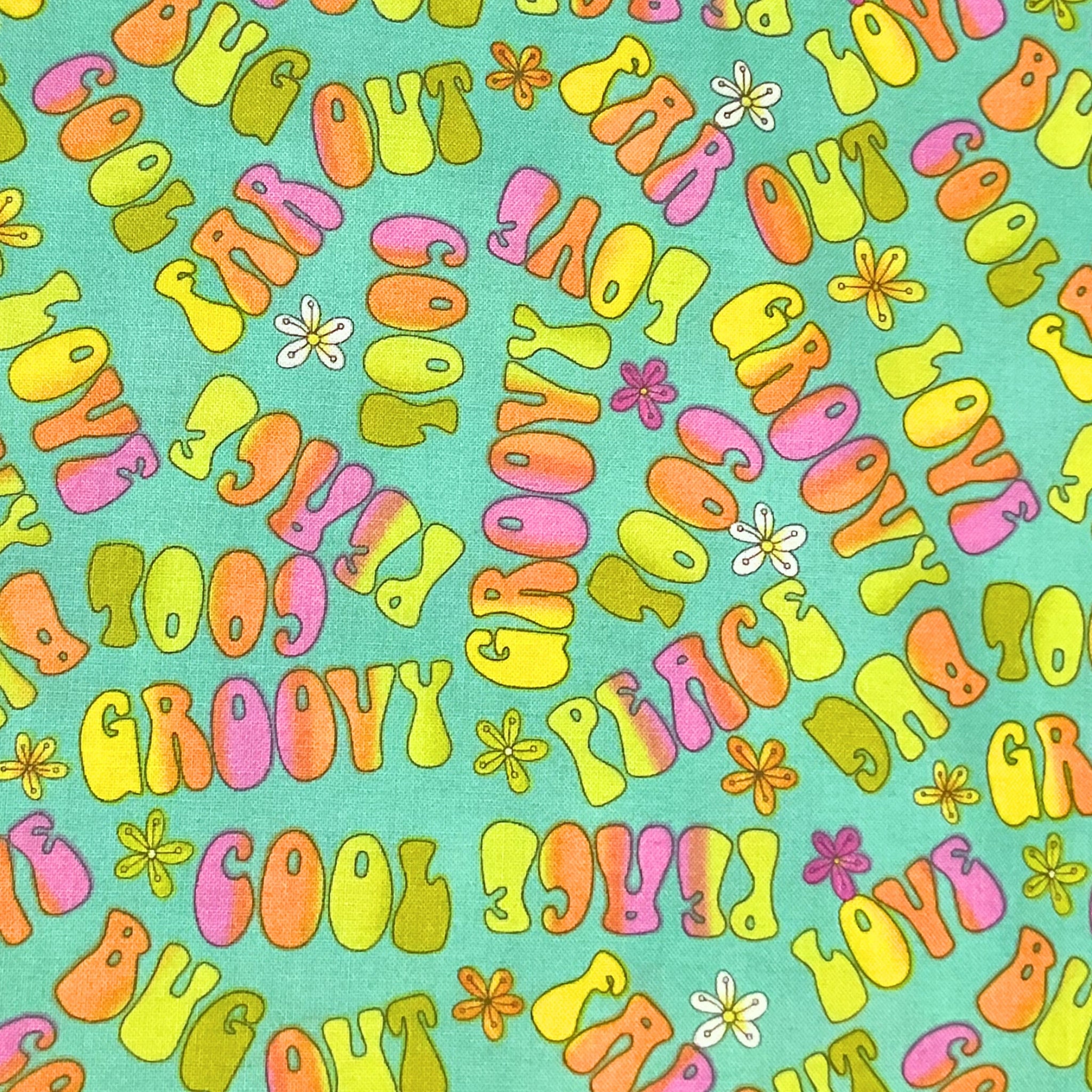 Retro groovy word toss turquoise pink orange yellow fabric for 60s 70s themed quilts bags patchwork sewing projects