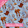 Western riding tack saddles boots horseshoes stirrups blue fabric for horse-themed quilts and equestrian patchwork sewing projects