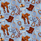 Western riding tack saddles boots horseshoes stirrups blue fabric for horse-themed quilts and equestrian patchwork sewing projects