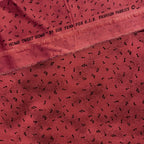 Tossed music notes mottled raspberry red novelty blender fabric for music quilts sashing music teacher gifts and patchwork projects