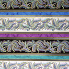 Striped horizontal fabric alternating with paisley and solid turquoise, purple, and black 