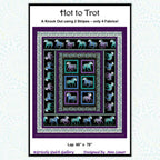 Hot to Trot quilt pattern 66" x78" showing a horse panel framed by purple and black stripe fabrics