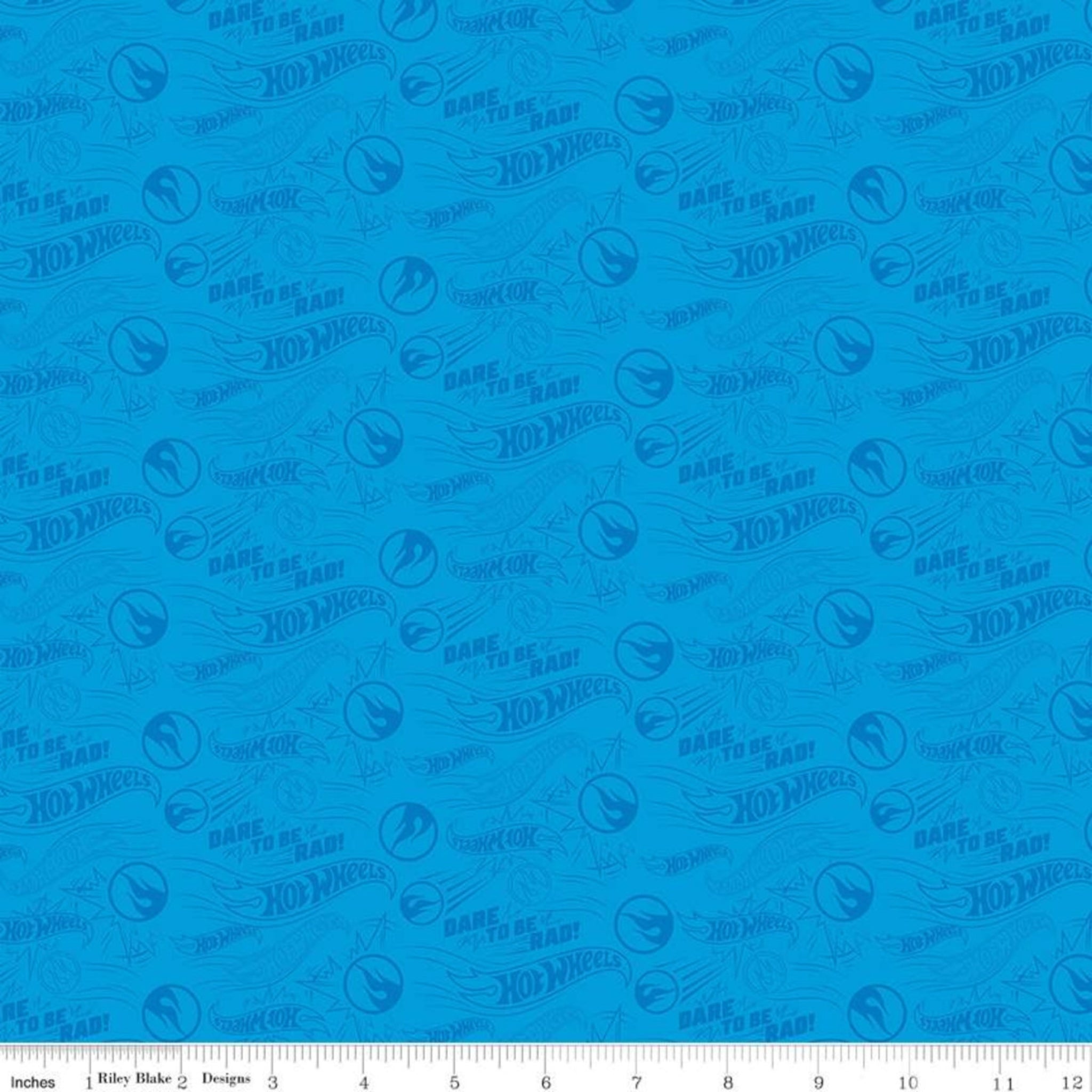 Hot Wheels Dare To Be Rad logo pattern on blue quilting cotton for boys quilts
