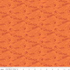 Hot Wheels pattern on orange fabric with measurement scale at the bottom.