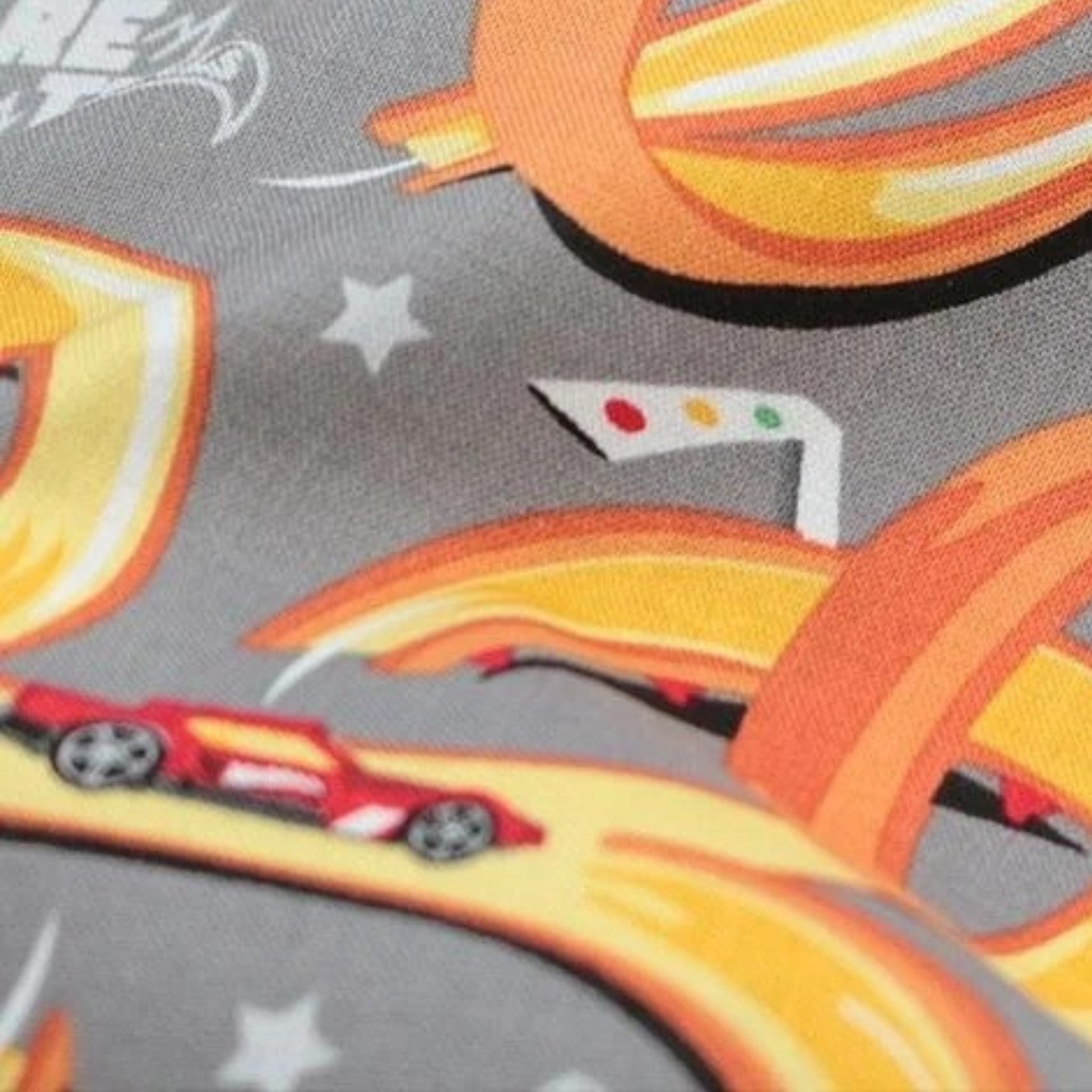 Hot Wheels grey fabric with racing track design and red race cars for boys quilting