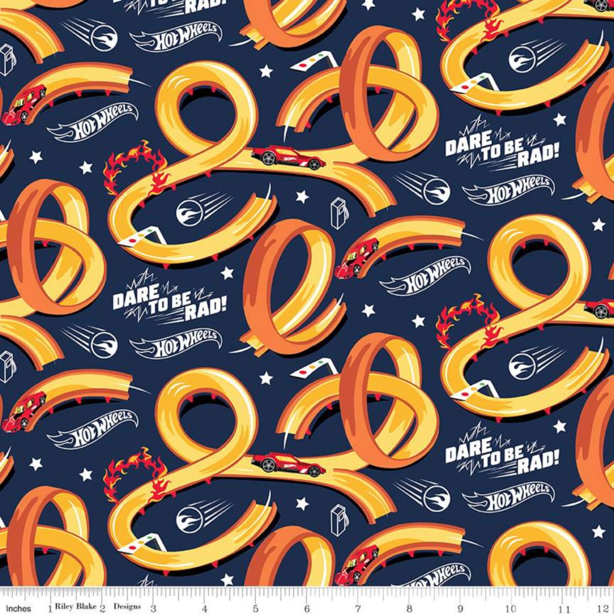 Hot Wheels racing track loops on navy blue quilting cotton for boys projects