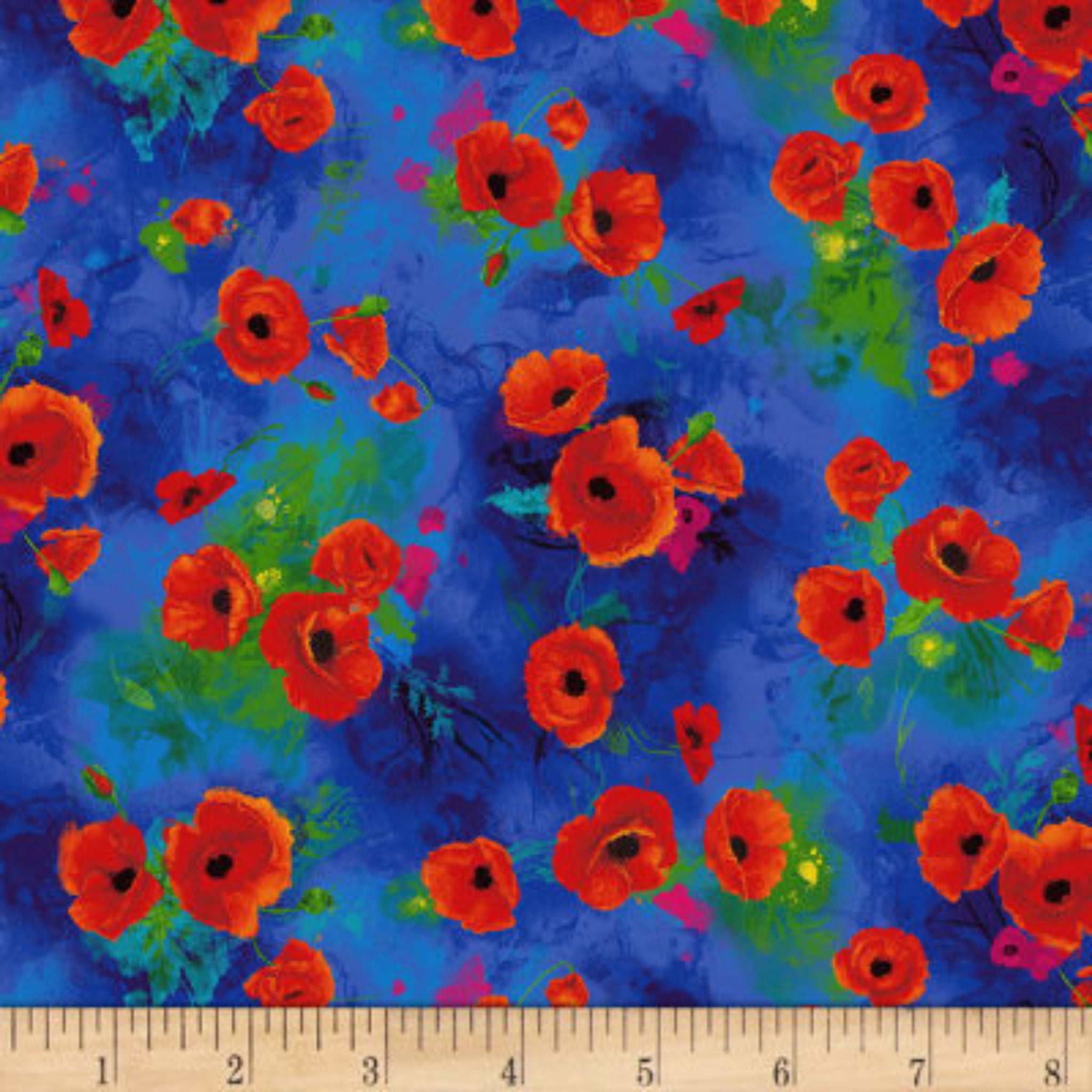 Red poppies on blue background fabric for feature quilts and patchwork sewing projects