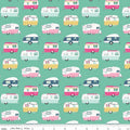 Pattern of vintage-style travel trailers on a teal background with a ruler at the bottom.