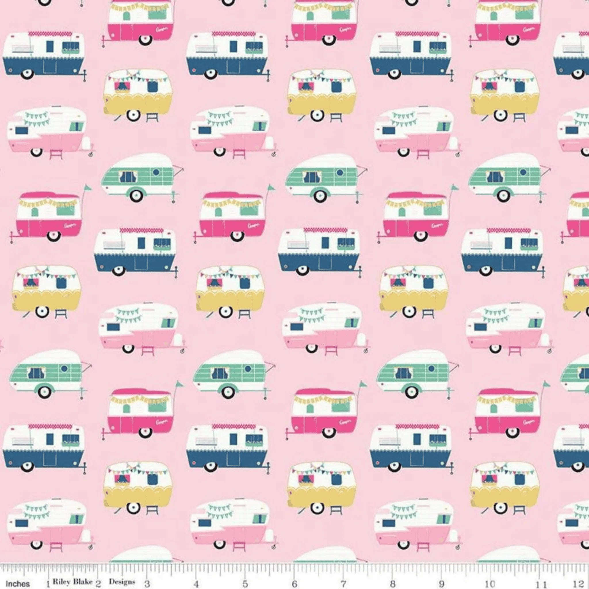 Pattern of vintage camper trailers on a pink background with a fabric yardage ruler at the bottom.