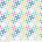 Geometric pinwheel patchwork print mint pink navy mustard yellow white quilting fabric for quilts bags cushions and nursery décor