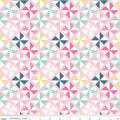 Geometric pinwheel quilting cotton fabric blender in mint, pink, navy, and yellow patchwork pattern