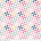 Geometric pinwheel quilting cotton fabric blender in mint, pink, navy, and yellow patchwork pattern