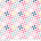Geometric pinwheel patchwork print pink mint navy mustard yellow white quilting fabric for quilts bags cushions and nursery décor