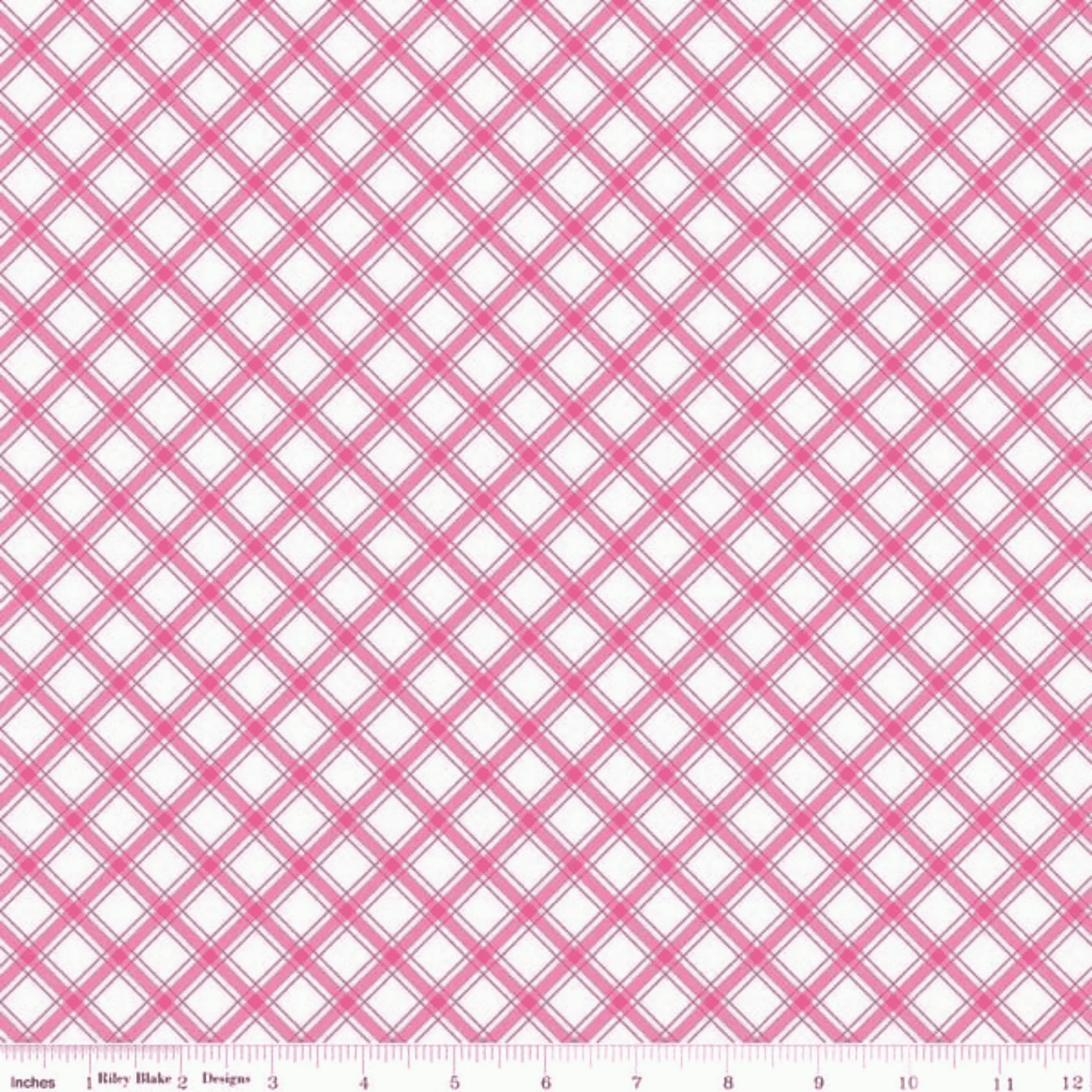 Hot pink and white diagonal plaid quilting cotton fabric. Ideal for blender and binding