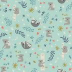 Illustrated koalas sloths eucalyptus branches botanical coral flowers soft mint fabric for baby quilts nursery and children's patchwork projects