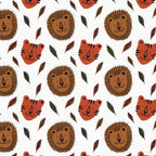 Lion and tiger faces tropical leaves white background kids novelty quilting fabric for children's quilts nursery décor and baby sewing projects