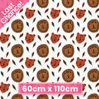 Lion and tiger faces tropical leaves white background kids novelty quilting fabric for children's quilts nursery décor and baby sewing projects