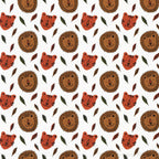 Lion and tiger faces tropical leaves white background kids novelty quilting fabric for children's quilts nursery décor and baby sewing projects
